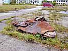 Irbene, Looted City: blown-down roof