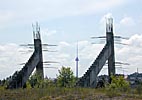 Old, half-finished Soviet sports stadium and the TV tower