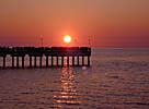 Palanga, the pier, sun going down
