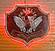 Sventoji, restaurang Parselio Rojus, grisens emblem