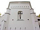 The church in Vyzuonos, with strange cannonball in the facade