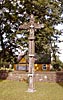 The church in Vyzuonos, wooden cross on the churchyard.