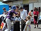 Market place, turgus, in Vilnius. Clothes. Women pulling at bras.